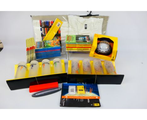 A quantity of Millennium Dome collectable items to include T Shirts, die-cast replica, glasses and other and a quantity of ch