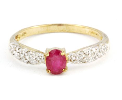 A 9ct yellow gold ruby and diamond set ring, (M.5).
