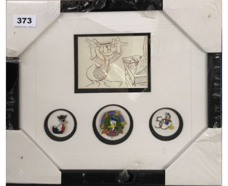 A framed Donald Duck 50th Anniversary print and badges.