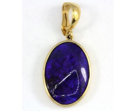 A 14ct yellow gold blue opal set pendant, with bale to be set in a pearl necklace, L. 3.2cm.