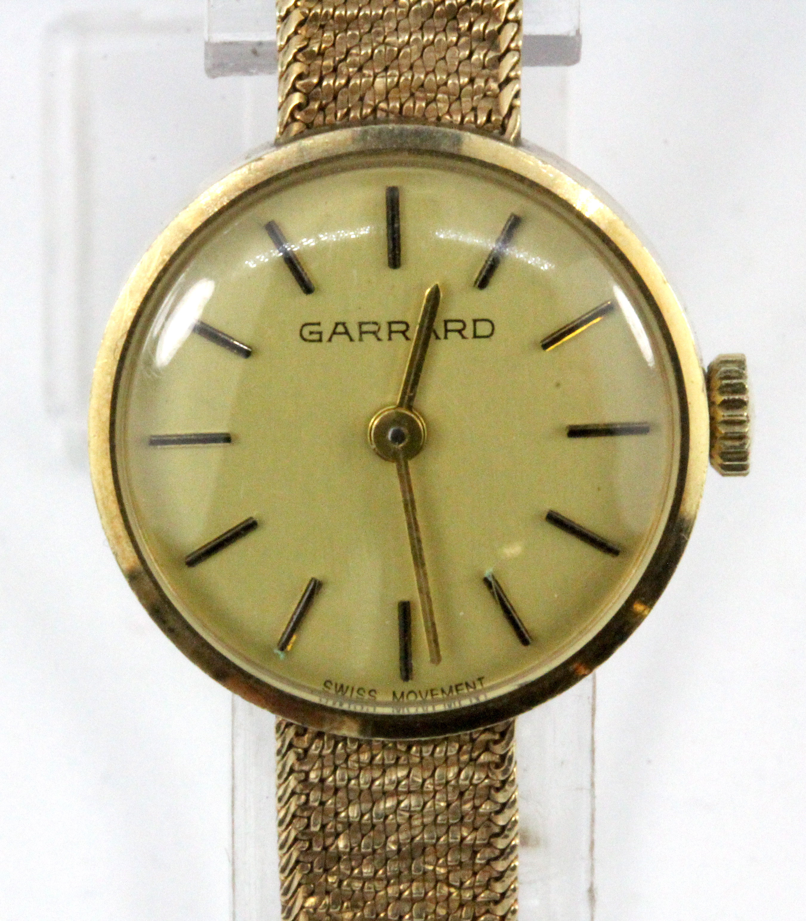 A lady's 9ct yellow gold Garrard presentation wrist watch, understood