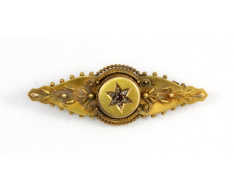 A 15ct yellow gold diamond and ruby set brooch, L. 4.5cm.