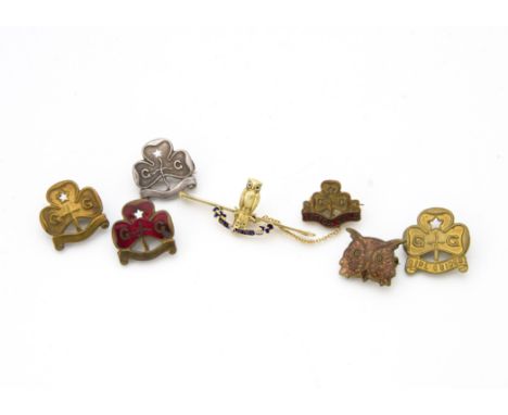 Of Girl Guide interest, five Girl Guide badges, one silver, together with a Wylie & Co owl head brooch with enamel, and a 15c