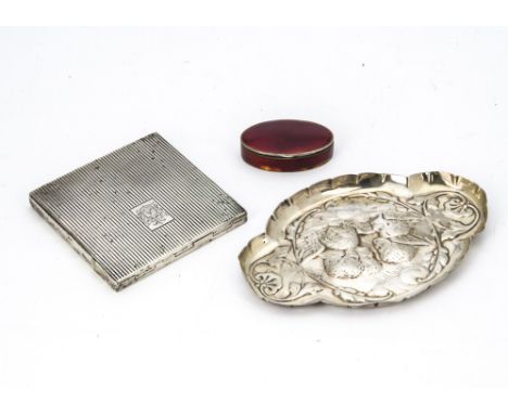 An Art Deco period silver and enamel pill box from Asprey & Co, red enamel oval box, damaged, together with a square silver c