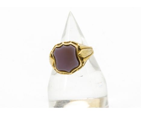 A Victorian 15ct gold and hardstone gentleman's signet ring, having a vacant shield shaped sardonyx panel, hallmarked, 4.8g a