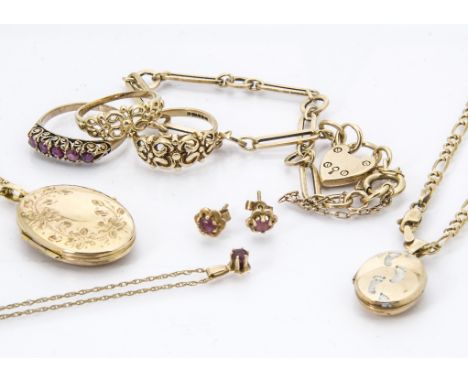 A collection of 9ct gold jewellery, including two lockets on chains, two rings, a bracelet, and a suite set with red stones o