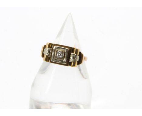 A retro style Middle Eastern yellow metal dress ring, having an old cut with white metal tablet, 3.4g and size S