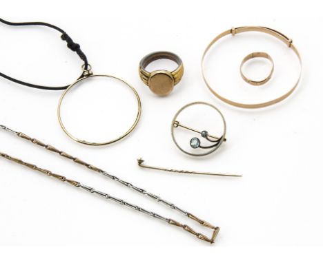 A 9ct gold child's bangle, 2.8g, together with a damaged 9ct gold ring, a 15ct gold and blue stone brooch, a stick pin lackin