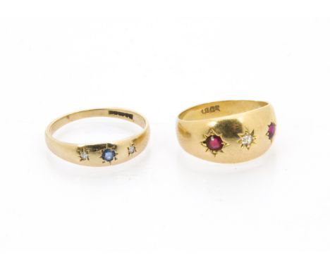 An 18ct gold ruby and diamond three stone ring, 2.8g and size I, together with another similar 9ct gold sapphire example, 1.2