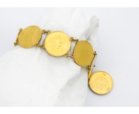 A vintage Eygptian Fuad I 50 Piastres gold coin bracelet, the seven 1923 gold coins with links and a box clasp supporting a f