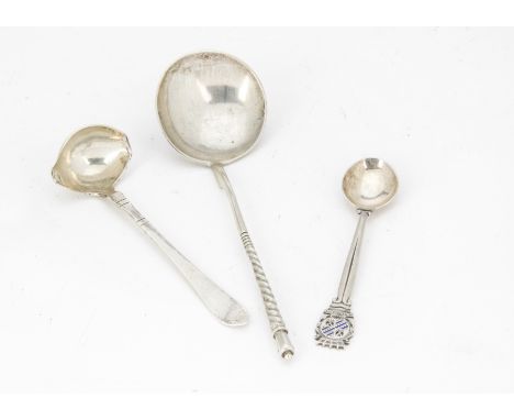 A small Art Deco silver sauce ladle by Georg Jensen, together with a Russian silver spoon and a souvenir spoon (3) 