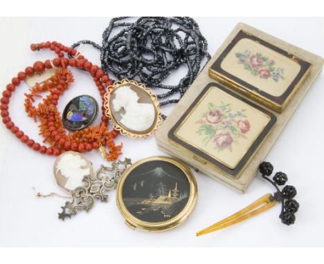 A small group of jewellery, including a 9c marked cameo brooch, and another similar, a coral bead necklace and a branch coral