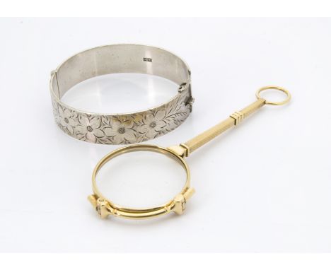 A 1970s silver bangle, together with a pair of gilt lorgnettes (2)