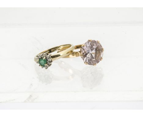 A modern 9ct gold emerald and diamond cluster ring, 1.8g, together with a continental gold and rose quartz solitaire ring, 3.