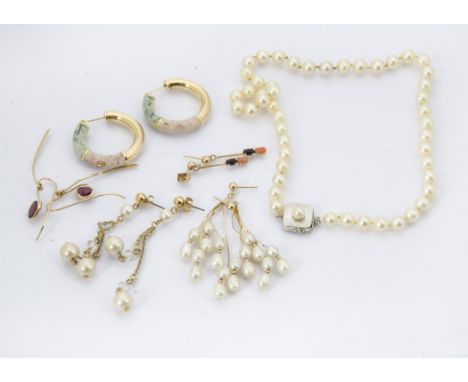 A small group of jewellery, including a pearl necklace, a pair of gold and rice pearl earrings, a pair of simulated pearl ear