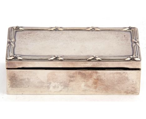 Antique hallmarked silver mounted ebony trinket box of plain polished rectangular form, the lid with reeded and bell border, 