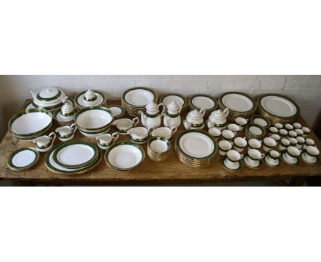 DINNER SERVICE, by Kevin Glancy, 'Creators of Exclusive Tableware', twelve place settings, including dinner plates, side plat