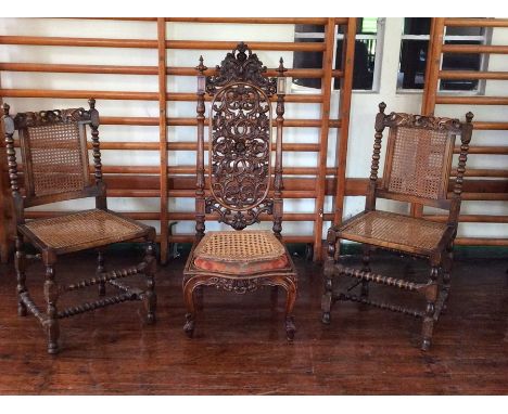 A Victorian walnut carved high backed hall chair, in the William and Mary style, circa 1860, drop in carved seat surround wit