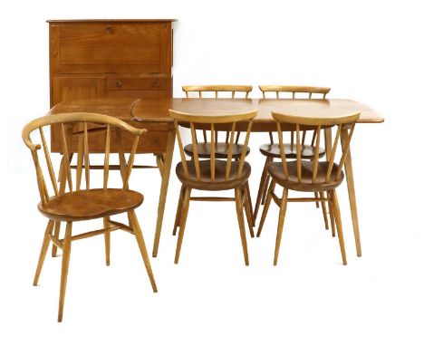 An Ercol dining table, 163cm long71cm deep72cm high, a table extension, 48cm long,five chairs,(1+4) and a cocktail cabinet, 9