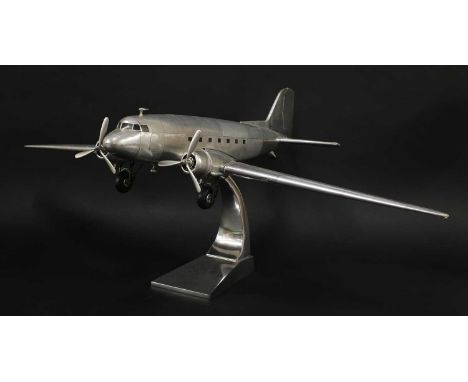 A modern model of a C-47 Dakota 'Skytrain',raised on an aluminium stand, stamped 'AM 2014 No. 2528',100cm wide65cm long40cm h