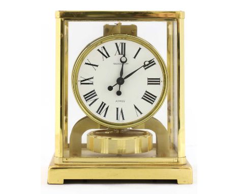 A Jaeger-LeCoultre 'Atmos' clock, No. 344932, having a white dial with black Roman numerals, 18cm wide13.2cm deep22.2cm highC