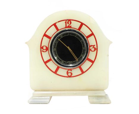 A Jaeger LeCoultre Art Deco mantel clock,in an onyx case, with a black circular dial with Arabic minutes, surrounded by a red
