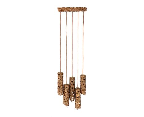 A brutalist copper ceiling light,1960s, Swedish, with five cylindrical copper splash shades, suspended from a copper fixture,