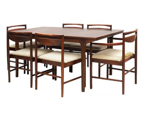 An A H McIntosh Indian rosewood dining suite,comprising:six chairs, (2+4), labelled '9513',a dining table,with two folding le