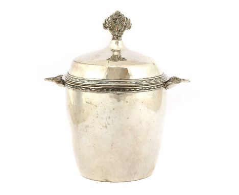 An Arts and Crafts silver-plated tea caddy,c.1915, by Edward Spencer for the Artificers' Guild, of barrel form, borders with 