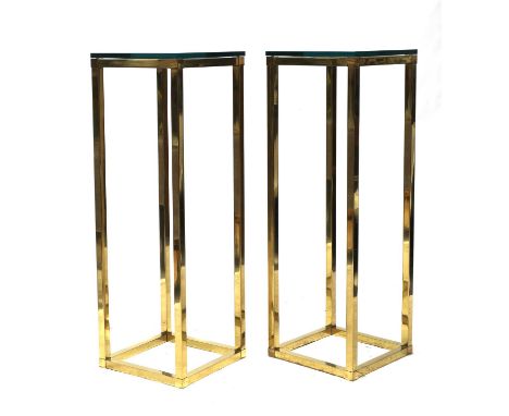 A pair of Italian brass étagères,1970s, each of rectangular form, with an 18mm square glass top, 42cm wide42cm deep122cm high