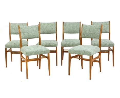 A set of six Italian teak 'model 602' dining chairs,designed by Gio Ponti in 1954, with light green backs and seats, 42.5cm w