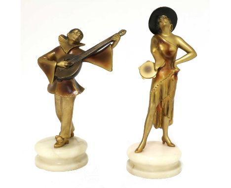 A pair of Lorenzl figures,1930s, both gold painted metal, in the form of musicians, one of a man with a lute, one of a woman 