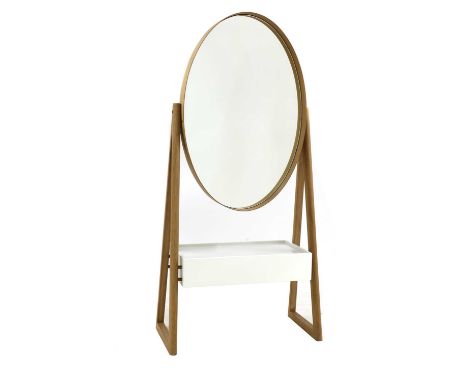 A contemporary light oak 'Iona' cheval mirror,designed by Russell Pinch for Heal's, with an oval mirror over a drawer, on a s