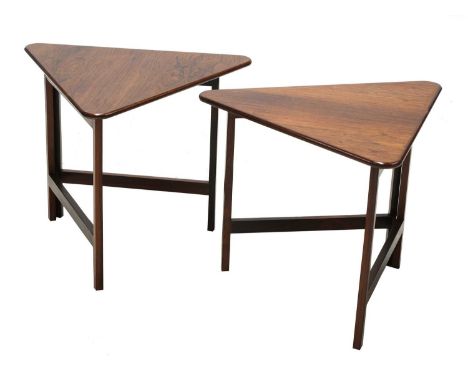 A pair of Danish rosewood triangular tables, §designed by Illum Wikkelsø for CFC Silkeborg, each with a triangular top on a h