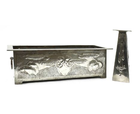 An Arts and Crafts embossed planter,attributed to Margaret Gilmour, with stylised designs, with a liner, 51cm wide21cm deep 1