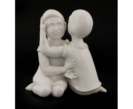 A Berlin porcelain figure of two children,attributed to Max Esser, c.1929, incised No. 13668, underglaze mark,12.5cm highSee 