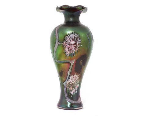 An Art Nouveau art glass vase,in the manner of Loetz, decorated with flower heads on an iridescent ground, unsigned, 36cm hig