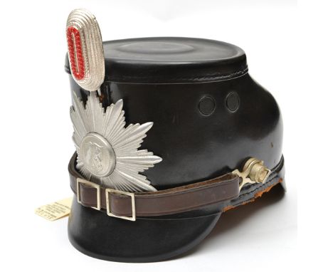 A similar shako,  of earlier appearance, with M31 combat helmet type leather liner and aluminium star badge with the arms of 