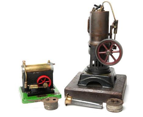 2 Stationary Steam Engines. A vertical boiler example by G.Bing. Water gauge mounted on the boiler and a maroon painted flywh