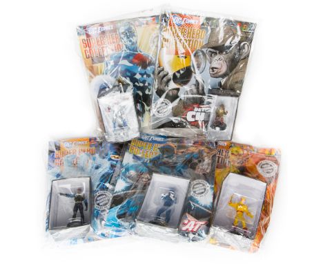 20 DC Comics Super Hero Collection comics and figures. Hawkgirl, Brainiac, Black Lightning, Cosmic Boy, Captain Atom, Power G