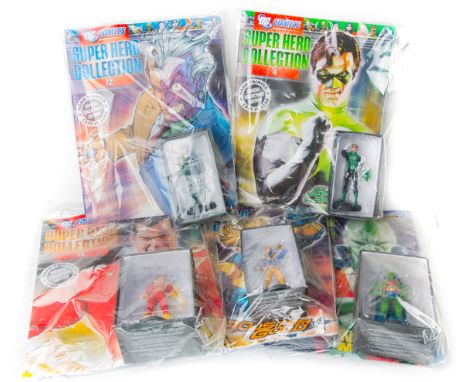 20 DC Comics Super Hero Collection comics and figures. Batman, Robin, Superman, The Joker, Green Lantern, Lex Luthor, Martian