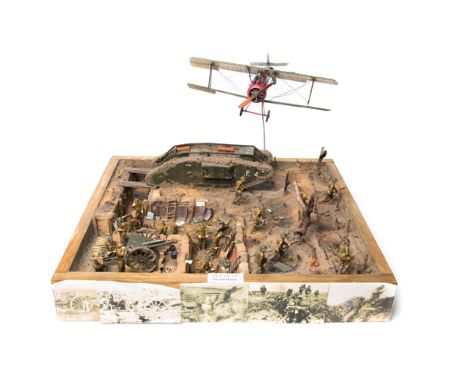 A similar diorama, again depicting a WW1 battle scene. Entitled Over The Top, by Lee Wares. Featuring two corners of a Britis