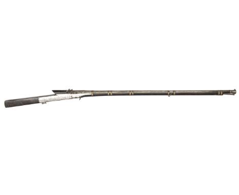 A large Indian 10 bore matchlock gun, torador,  72” overall, barrel 51” with flared and engraved muzzle, the breech with balu