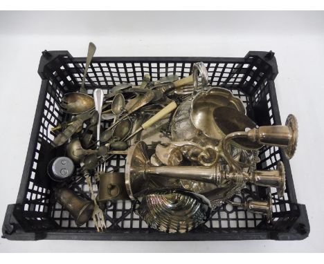 A selection of silver plated items including a three branch candelabra.