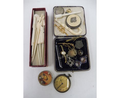 A selection of mixed collectables to include a French polished steel circular purse, enamel badges etc.