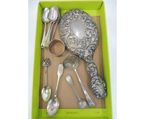 A set of six silver teaspoons, four further silver spoons including a sifter, a silver backed mirror and a serviette ring.