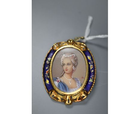 A 750 yellow metal and enamel mounted oval portrait pendant brooch, 39mm, gross 11.1 grams.