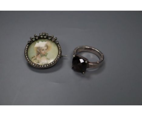 A sterling and seed pearl set portrait brooch, 25mm and a Thomas Sabo 925 ring.