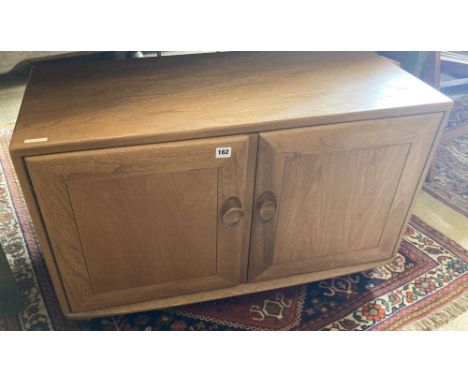 An Ercol light elm cabinet, width 91cm, depth 43cm, height 56cm