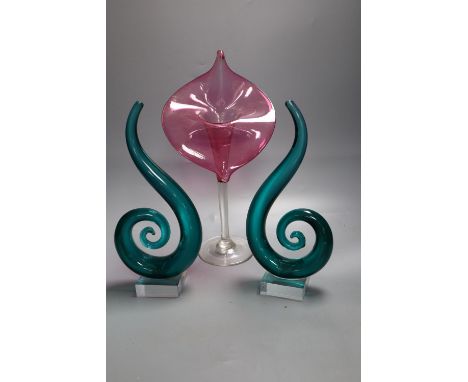 A ruby 'Jack in the Pulpit' glass vase, height 32cm and a pair of green glass scrolls